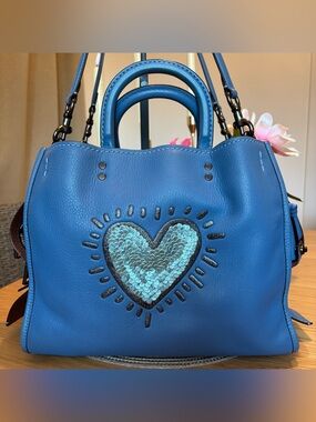 COACH X KEITH HARING BLUE PEBBLE LEATHER SEQUIN HEART ROGUE SATCHEL